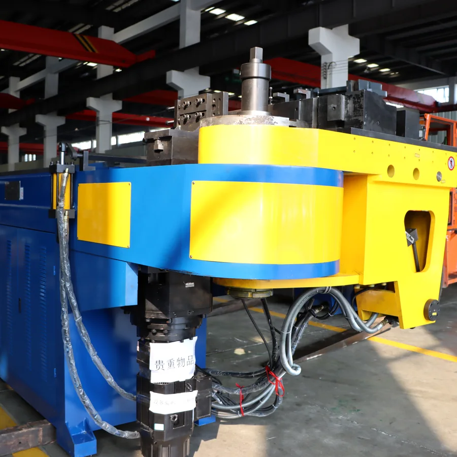 Close view of Telhoo CNC pipe bending machine head and clamping area
