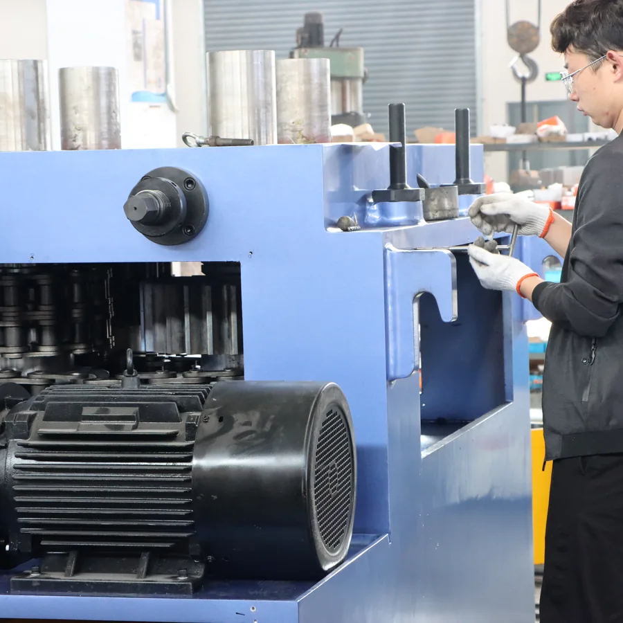 Pipe rolling machine operator checking JW-80 rollers