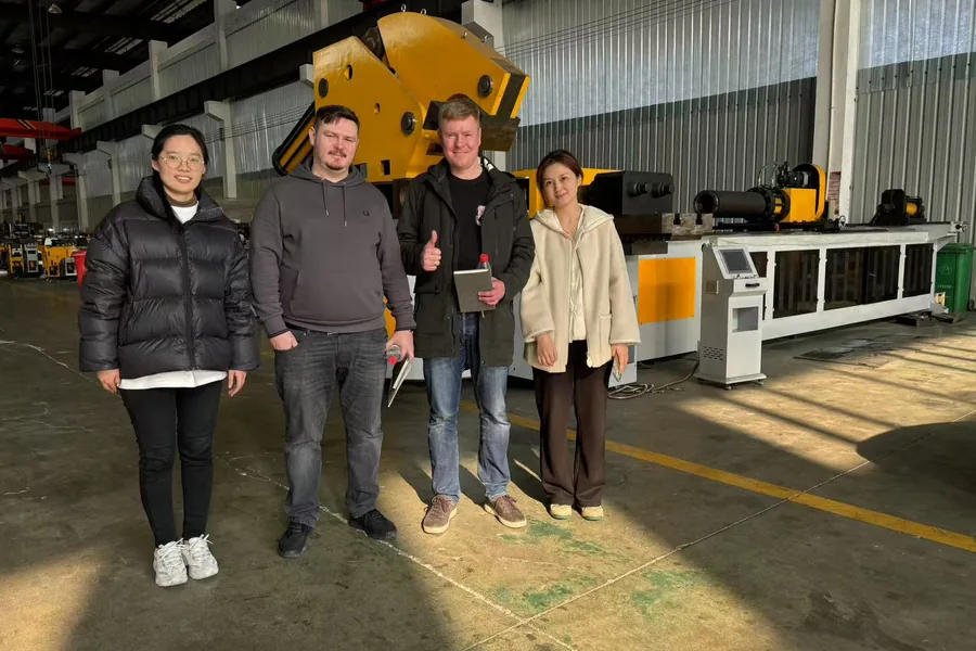 Foreign buyers inspecting CNC pipe bending machines at the Telhoo factory